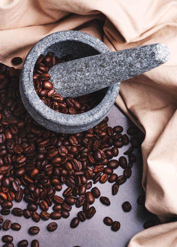 grind coffee beans with a grinder